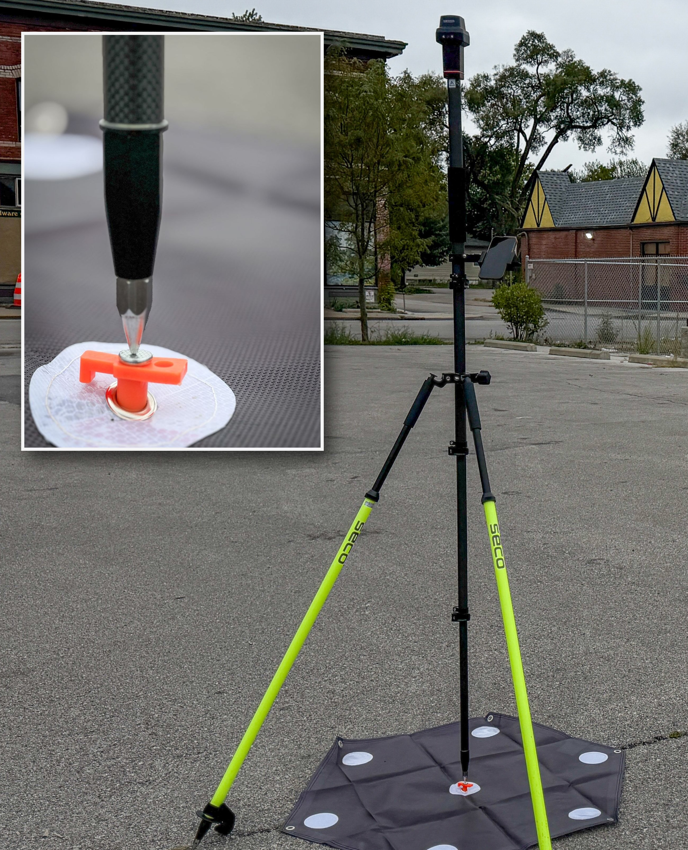 GNSS RTK rover on a SECO survey tripod occupying a ground control target, with an inset close-up of the survey point being punched into the target eyelet — measured in against the INDOT InCORS network before flight.