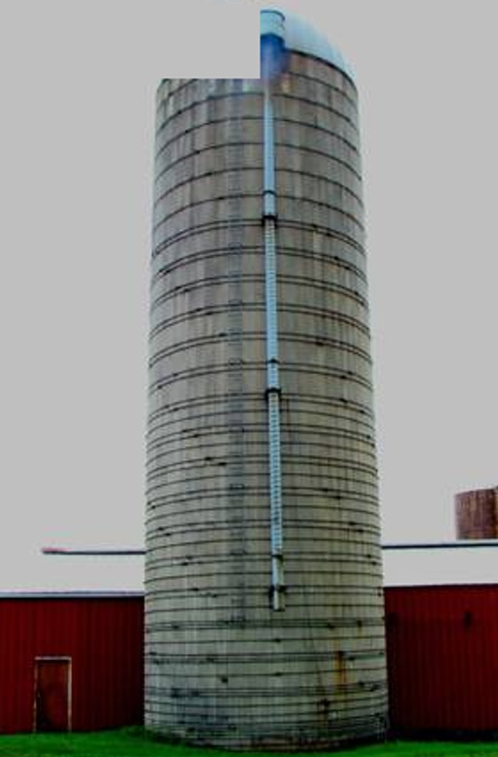 Visible-light photo of a concrete stave grain silo