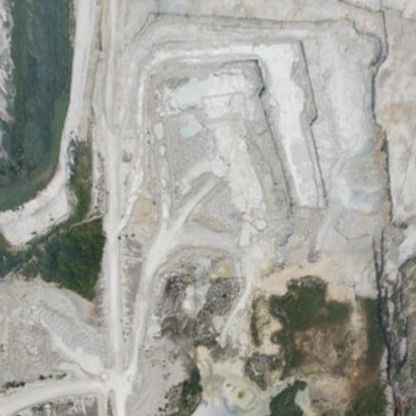 True-color RGB orthomosaic of the full 1,000-acre mine, showing the benched pit, haul roads, settling ponds, processing area, and surrounding vegetation from directly overhead
