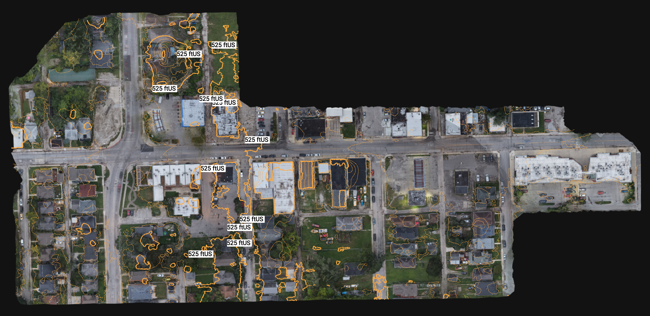 The same orthomosaic overlaid with orange topographic contour lines labeled in feet, tracing every grade change across the blocks